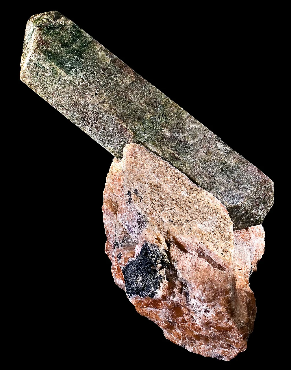 Elongated apatite crystal in calcite