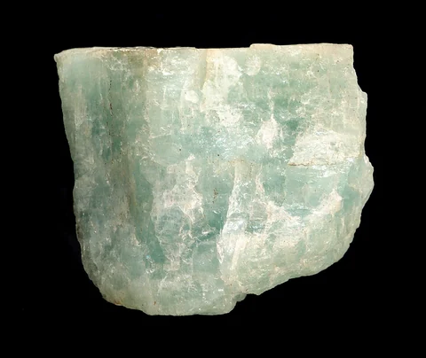 Rough, angular aquamarine specimen with a pale blue-green colour.