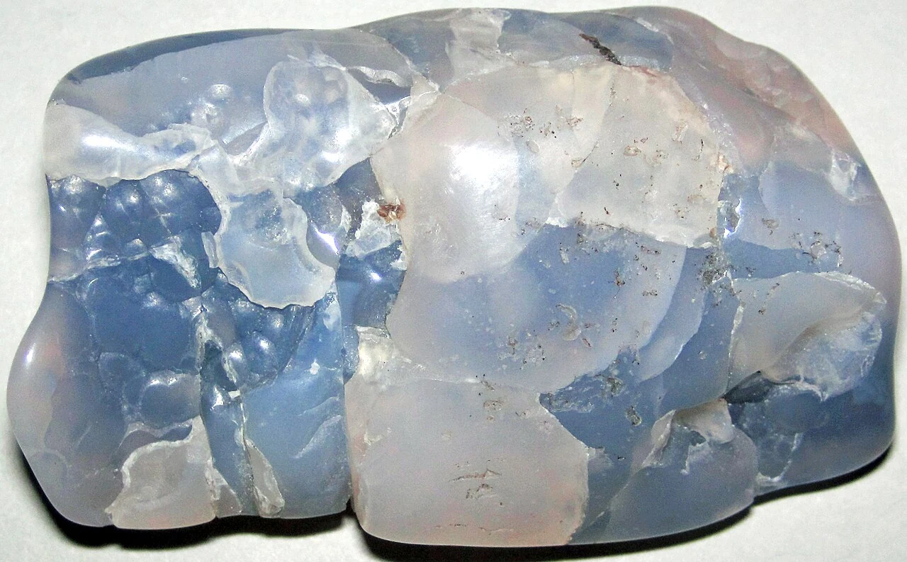 Bluish tumbled chalcedony with pale zones