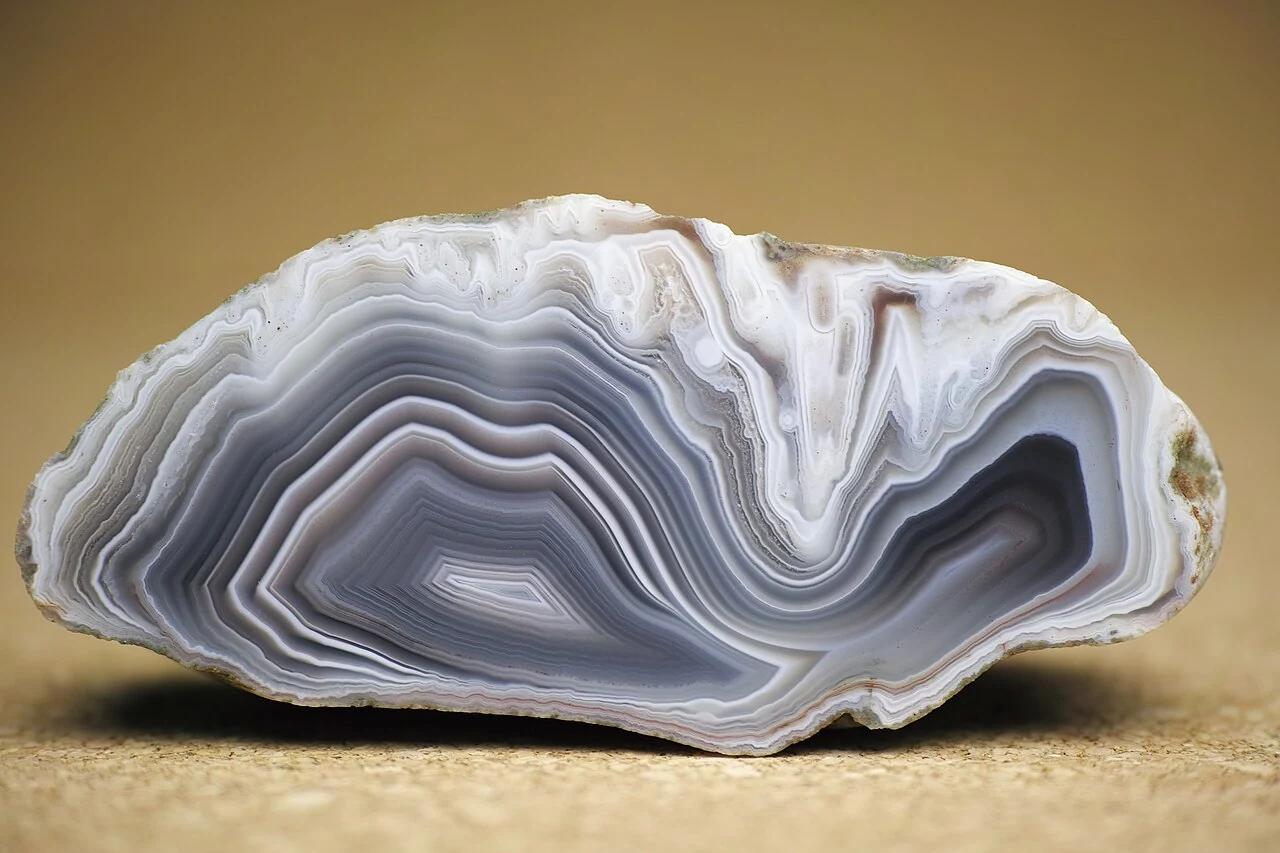 Agate section from Botswana with grey and white bands