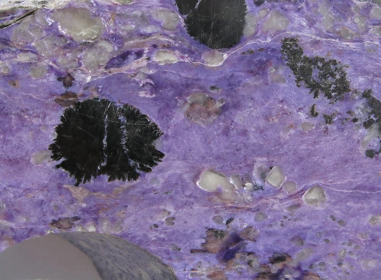 Charoite with black aegirine aggregates