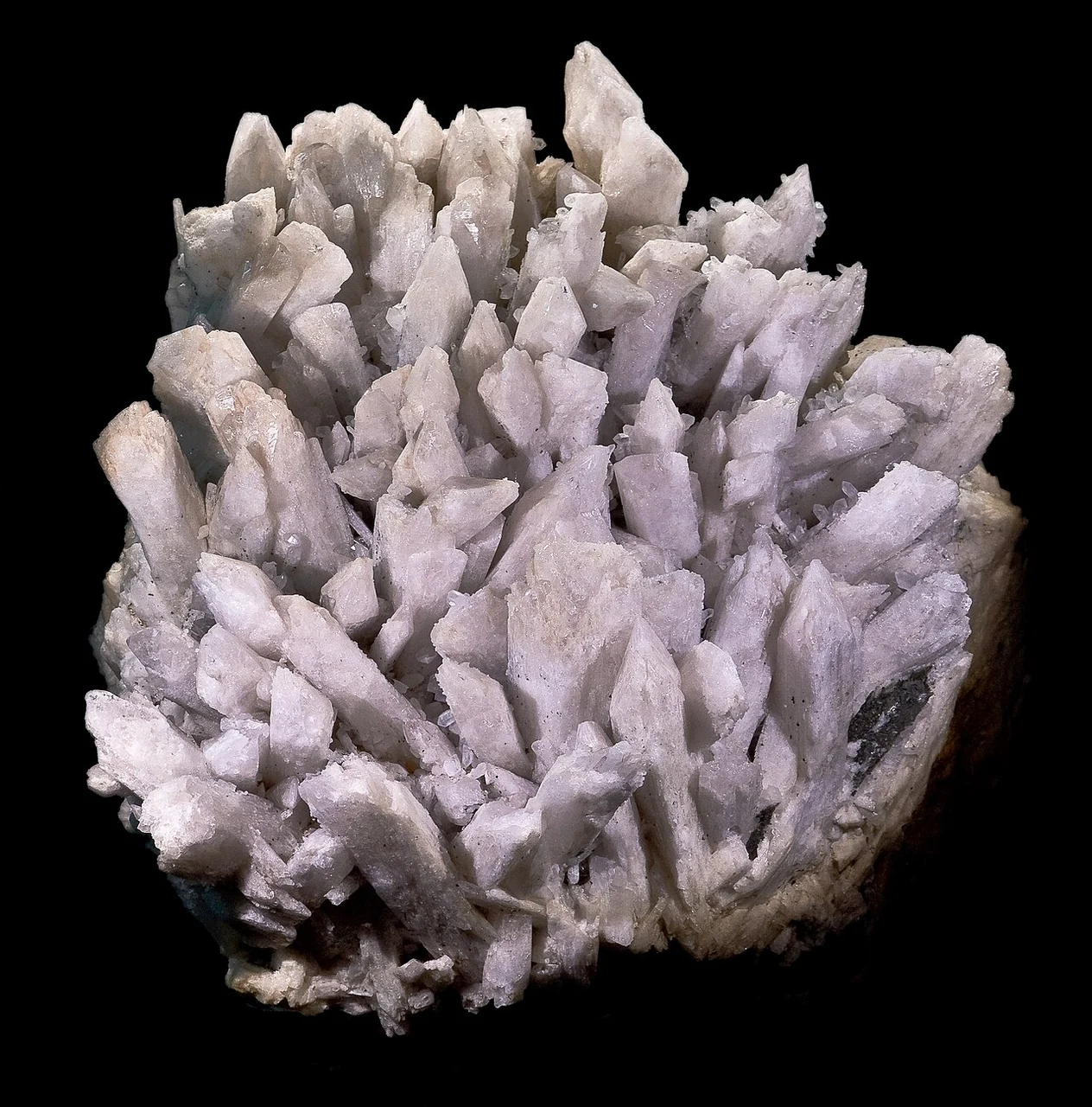 Cluster of pale danburite crystals from Mexico