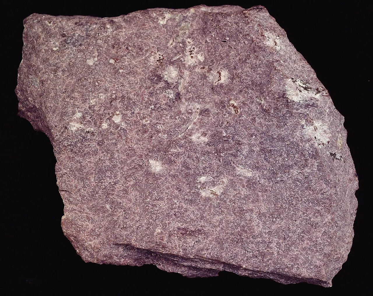 Purplish rough dumortierite specimen