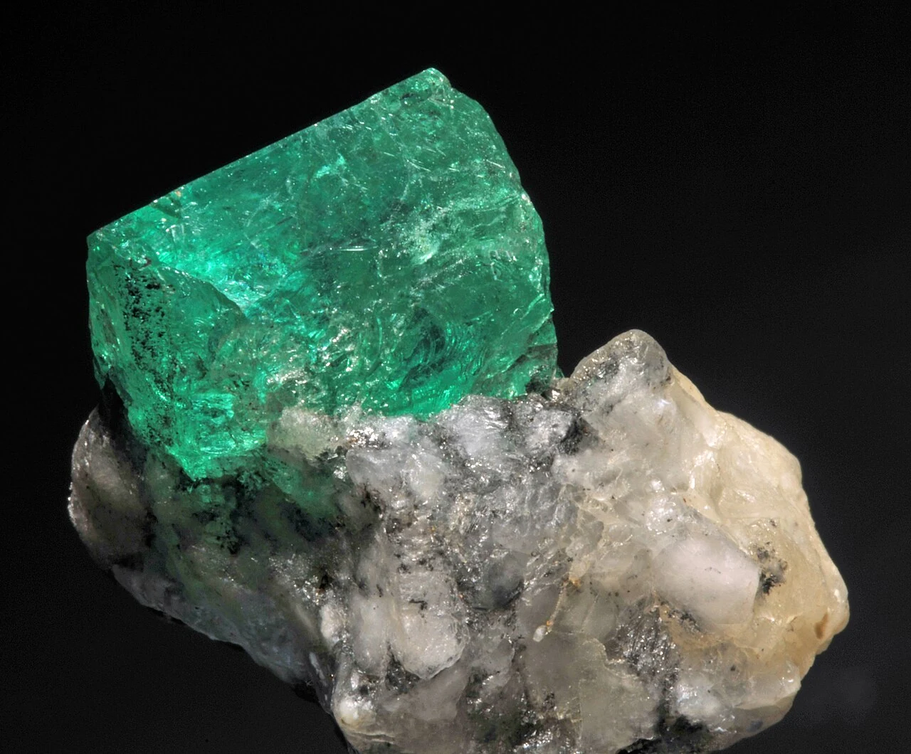 Emerald on a pale matrix from Muzo