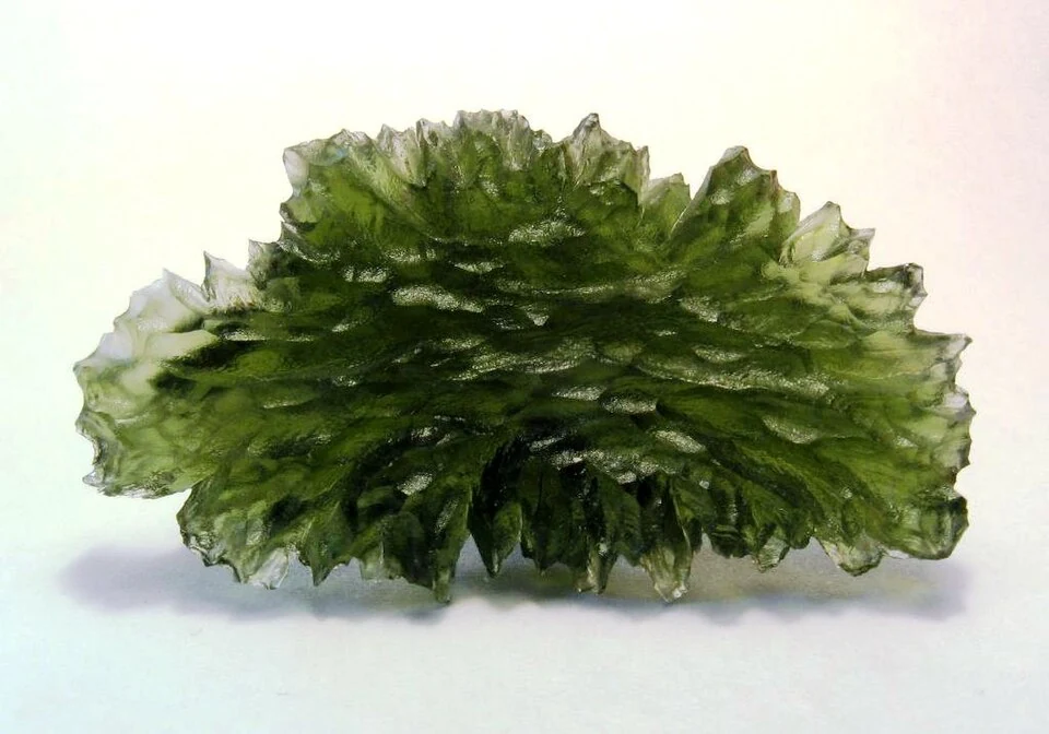 Green moldavite from Besednice with a sculptured surface