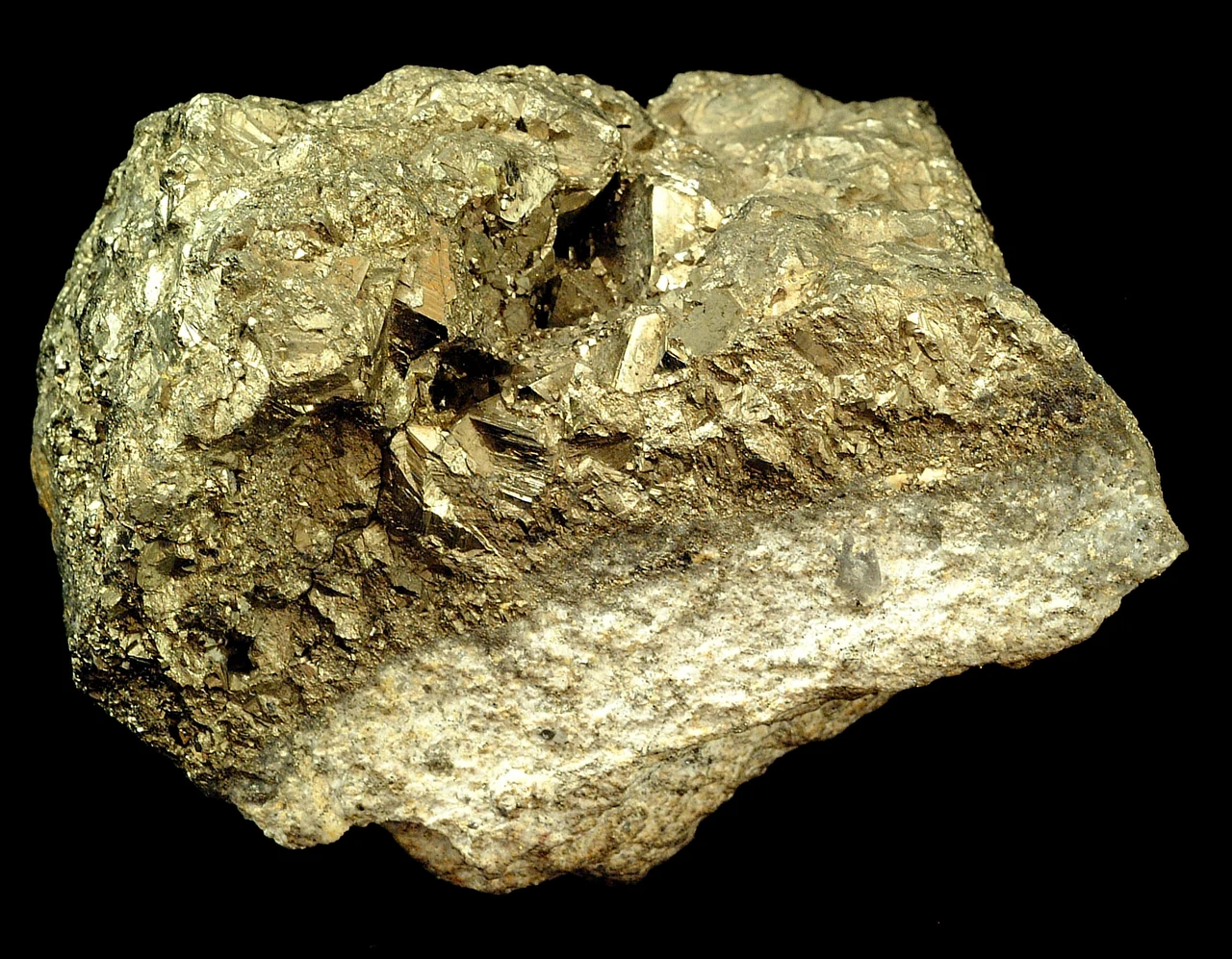 Massive pyrite specimen with a gold-coloured metallic uneven surface.