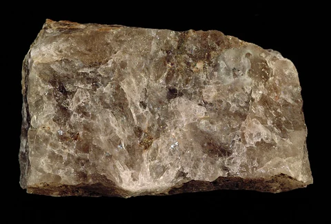 Rough brown smoky quartz specimen with an irregular surface.