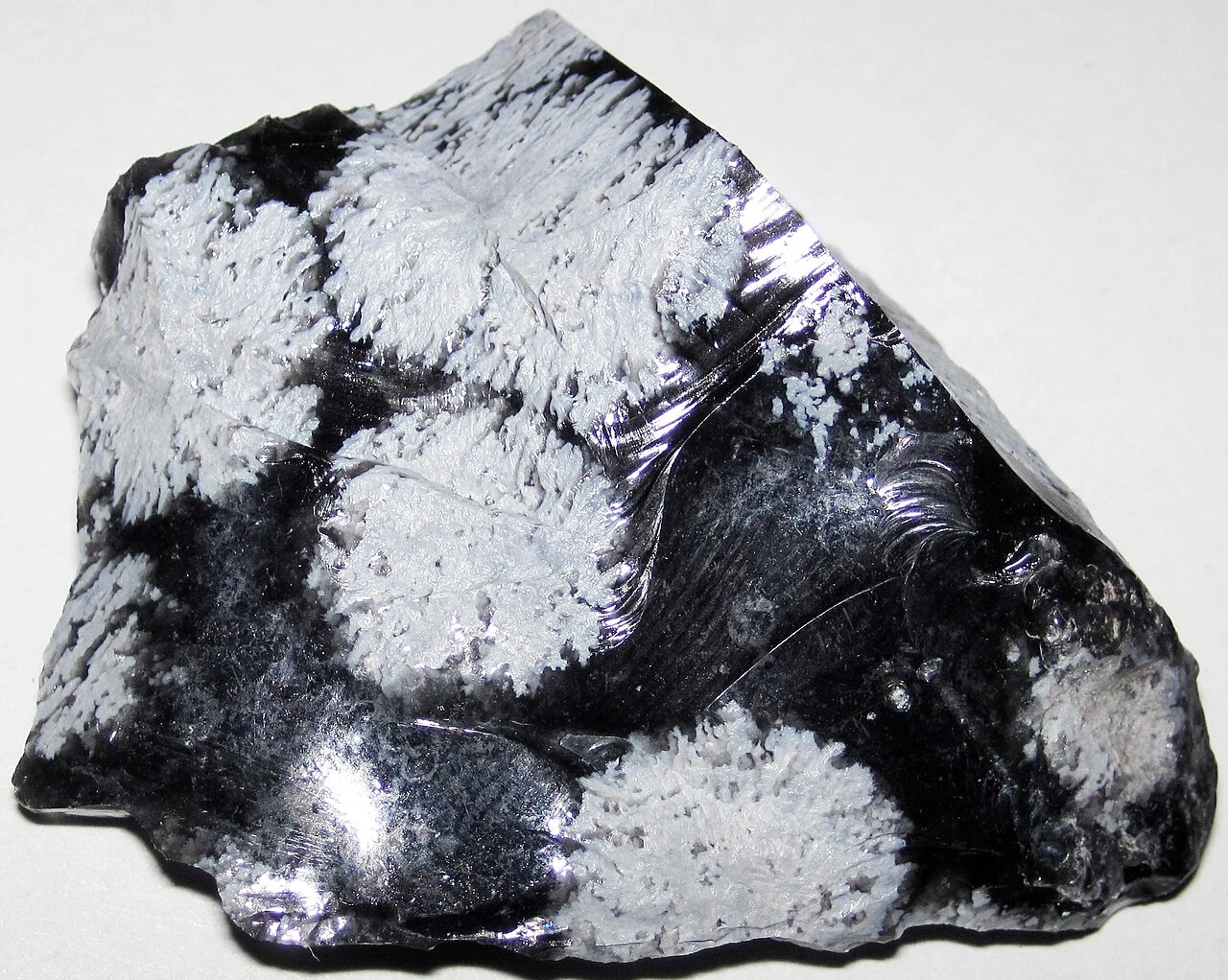 Snowflake obsidian shard with white patches