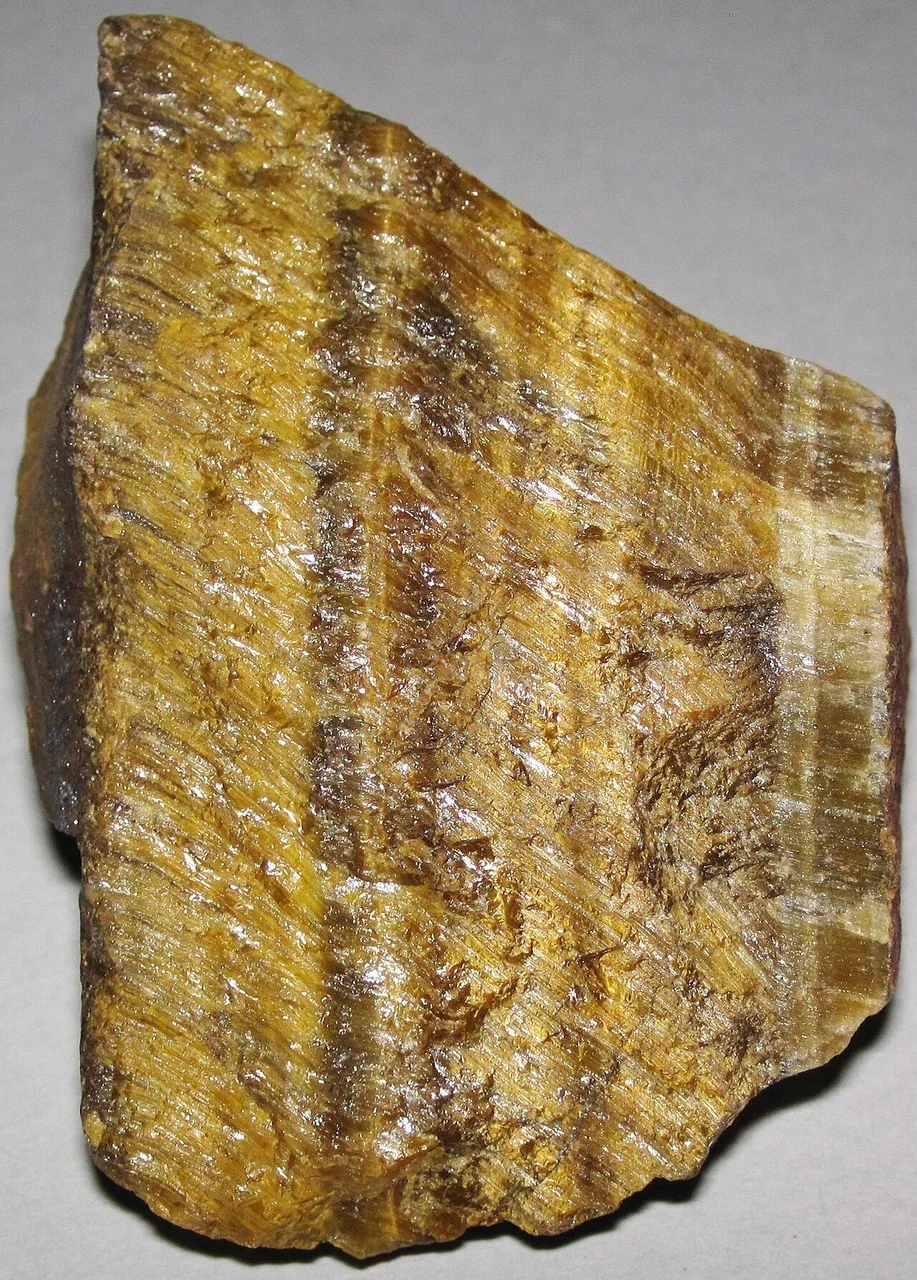 Rough tiger’s eye with brown-gold bands